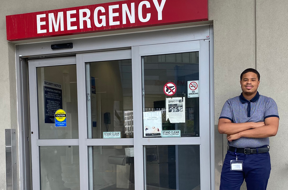 Rodney Babb standing near emergency department door